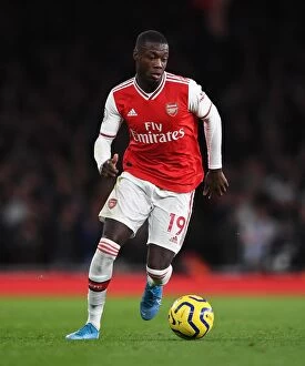 Images Dated 6th December 2019: Arsenal's Nicolas Pepe in Action: Arsenal vs Brighton, Premier League 2019-20