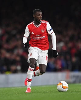Images Dated 28th February 2020: Arsenal's Nicolas Pepe in Action: Arsenal vs. Olympiacos, Europa League 2020