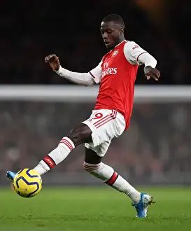 Arsenal V Brighton And Hove Albion 2019-20 Prints: Arsenal's Nicolas Pepe in Action Against Brighton & Hove Albion
