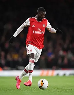 Arsenal's Nicolas Pepe in Action: Europa League Clash Against Olympiacos