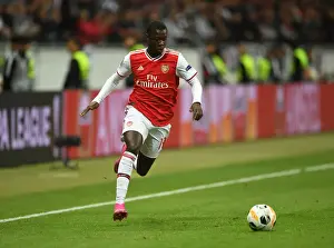 Eintracht Frankfurt V Arsenal 2019-20 Prints: Arsenal's Nicolas Pepe in Action: Europa League Showdown against Eintracht Frankfurt