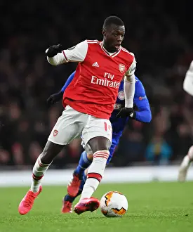 Arsenal's Nicolas Pepe in Action: Europa League Showdown Against Olympiacos
