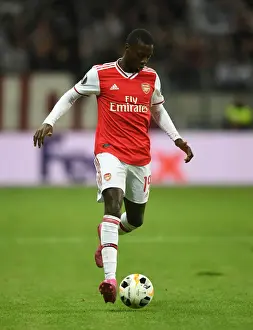Eintracht Frankfurt V Arsenal 2019-20 Prints: Arsenal's Nicolas Pepe in Action: Europa League Showdown vs. Eintracht Frankfurt