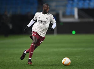 Images Dated 26th November 2020: Arsenal's Nicolas Pepe in Action against Molde FK in UEFA Europa League Group Stage