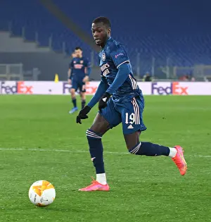 SL Benfica V Arsenal 2020-21 Prints: Arsenal's Nicolas Pepe in Action against SL Benfica in UEFA Europa League Round of 32