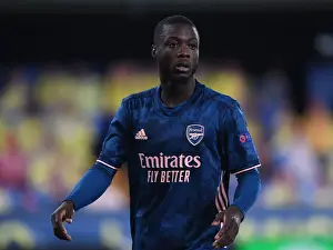 Villarreal V Arsenal 2020-21 Prints: Arsenal's Nicolas Pepe in Action: UEFA Europa League Semi-Final vs Villarreal Amidst Empty Stands
