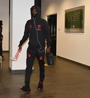 Arsenal's Nicolas Pepe Arrives at Emptied Emirates Stadium Ahead of Arsenal v Tottenham Hotspur Premier League Clash (2021)