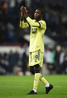West Bromwich Albion V Arsenal - Carabao Cup 2021-22 Prints: Arsenal's Nicolas Pepe Celebrates after Carabao Cup Victory over West Bromwich Albion