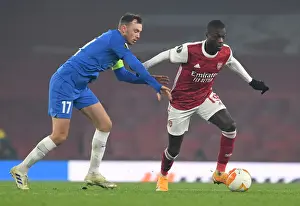 Arsenal's Nicolas Pepe Clashes with Molde's Fredrik Aursnes in Europa League Showdown