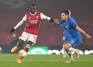 Arsenal's Nicolas Pepe Clashes with Molde's Kristoffer Haugen in Europa League Battle