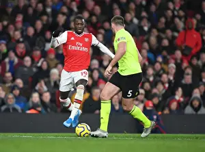 Arsenal V Sheffield United 2019-20 Prints: Arsenal's Nicolas Pepe Clashes with Sheffield United's Jack O'Connell in Premier League Showdown