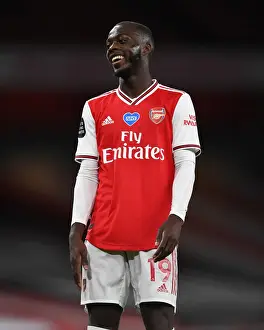 Arsenal V Liverpool 2019-20 Prints: Arsenal's Nicolas Pepe in Empty Emirates Stadium: Arsenal FC vs Liverpool FC