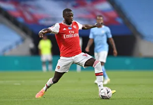 Arsenal V Manchester City - FA Cup Semi-Final 2019-20 Prints: Arsenal's Nicolas Pepe in FA Cup Semi-Final Clash Against Manchester City