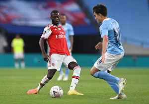 Arsenal V Manchester City - FA Cup Semi-Final 2019-20 Prints: Arsenal's Nicolas Pepe in FA Cup Semi-Final Showdown against Manchester City