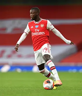 Arsenal's Nicolas Pepe Faces Empty Emirates Stadium in Arsenal vs. Liverpool (2019-20)