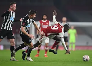 Arsenal's Nicolas Pepe Faces Off Against Newcastle's Paul Dummett in FA Cup Clash
