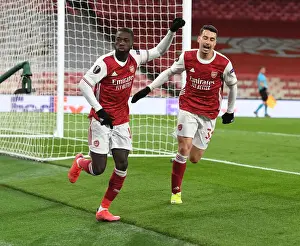 Arsenal's Nicolas Pepe and Gabriel Martinelli Celebrate Goal in Empty Emirates Stadium During Europa League Quarterfinal vs Slavia Praha