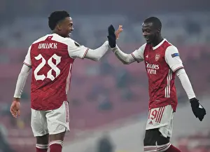 Arsenal's Nicolas Pepe and Joe Willock Celebrate Goals Against Molde in Europa League