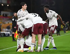 Arsenal's Nicolas Pepe Scores, Celebrates with Team Mates against Wolverhampton Wanderers in Premier League