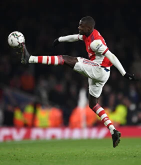 Images Dated 21st December 2021: Arsenal's Nicolas Pepe Shines in Carabao Cup Quarterfinal Against Sunderland