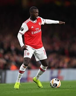 Arsenal v Standard Liege 2019-20 Collection: Arsenal's Nicolas Pepe Shines in Europa League Clash against Standard Liege