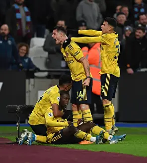 Arsenal's Nicolas Pepe and Teammates Celebrate Goal Against West Ham United, Premier League 2019-20