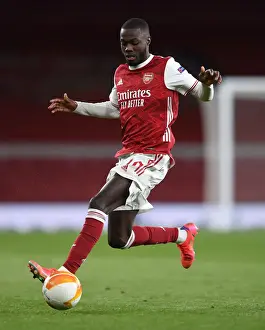 Arsenal V Villarreal 2020-21 Prints: Arsenal's Nicolas Pepe in UEFA Europa League Semi-Final: Arsenal vs Villarreal CF (Behind Closed Doors)