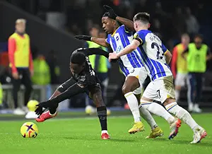Arsenal's Nketiah Clashes with Brighton's Gilmour in Premier League Showdown