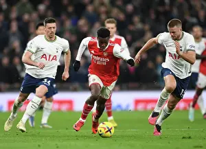 Tottenham Hotspur V Arsenal 2022-23 Prints: Arsenal's Nketiah Clashes with Tottenham's Lenglet and Dier in Premier League Showdown