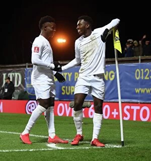 Oxford United v Arsenal - FA Cup 2023 Collection: Arsenal's Nketiah and Saka: Celebrating Goals in FA Cup Victory over Oxford United