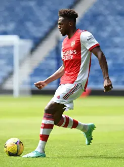 Arsenal's Nuno Tavares in Action: Arsenal vs Glasgow Rangers at Ibrox Stadium