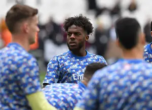 West Ham United V Arsenal 2021-22 Prints: Arsenal's Nuno Tavares Gears Up for West Ham Clash in Premier League Showdown
