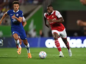 Arsenal V Chelsea - Florida Cup 2022-23 Prints: Arsenal's Nuno Tavares Outmaneuvers Chelsea's Ethan Ampadu in Florida Cup Clash