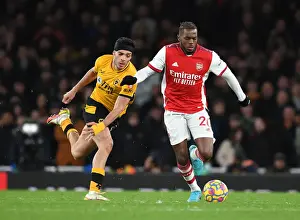 Arsenal's Nuno Tavares Outsmarts Raul Jimenez: A Premier League Battle at Emirates Stadium