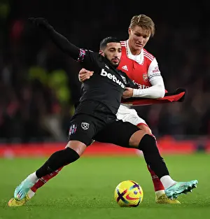 Arsenal's Odegaard Chases Down Benrahma: A Battle of Determination in Arsenal vs. West Ham Match