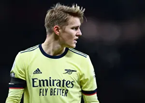Manchester United V Arsenal 2020-21 Prints: Arsenal's Odegaard Clashes with Manchester United in Premier League Showdown (2020-21)