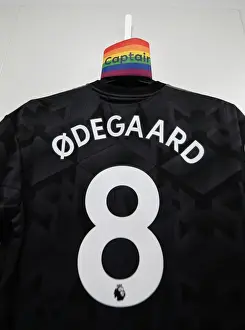 Arsenal's Odegaard Prepares for Southampton Clash: Captain's Armband and Shirt in Changing Room