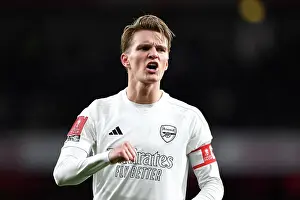 Arsenal V Liverpool FA Cup 2023-24 Prints: Arsenal's Odegaard Reacts in All-White: Uniting Against Knife Crime in FA Cup Clash vs