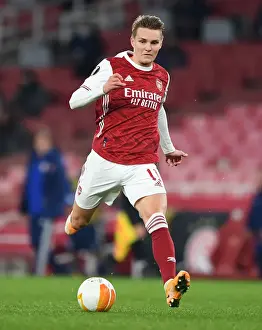 Arsenal's Odegaard Shines in Empty Emirates: UEFA Europa League Clash Against Olympiacos
