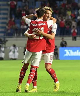Arsenal's Odegaard and Vieira Celebrate Goal Against AC Milan at Dubai Super Cup