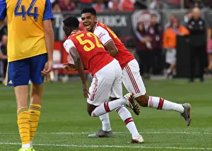 Arsenal's Olayinka and John-Jules: Celebrating a Goal Against the Colorado Rapids