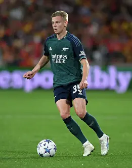 RC Lens V Arsenal 2023-24 Prints: Arsenal's Oleksandr Zinchenko in Action against RC Lens in the 2023-24 UEFA Champions League