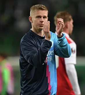 Sporting Lisbon V Arsenal 2022-23 Prints: Arsenal's Oleksandr Zinchenko Celebrates Europa League Victory with Fans