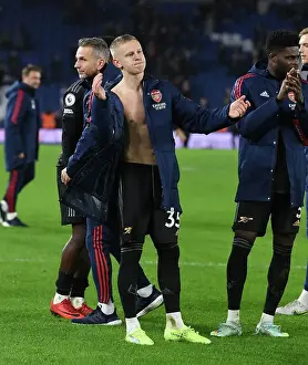 Arsenal's Oleksandr Zinchenko Celebrates with Fans after Brighton Victory