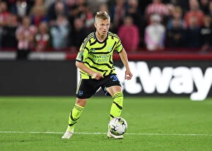 Images Dated 27th September 2023: Arsenal's Oleksandr Zinchenko Charges Forward in Carabao Cup Clash Against Brentford