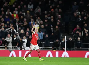 Arsenal's Oleksandr Zinchenko Raises Fist to Fans Amidst Dramatic Tottenham Clash (2022-23)