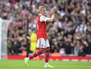 Arsenal's Oleksandr Zinchenko Salutes Fans Amidst Intense Arsenal v Tottenham Rivalry (2022-23)