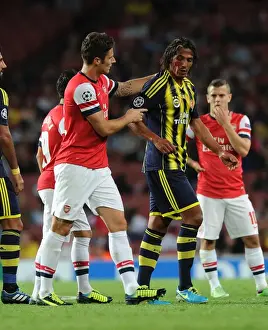 Arsenal V Fenerbahce 2013-14 Prints: Arsenal's Olivier Giroud Clashes with Fenerbahce's Bruno Alves in UEFA Champions League Play-offs