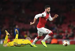 Arsenal V BATE Borisov 2017-18 Prints: Arsenal's Olivier Giroud Faces Off Against BATE Borisov's Evgeni Berezkin in UEFA Europa League Clash