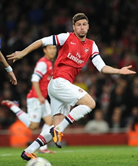 Arsenal V Chelsea - Capital One Cup 4th Rd 2013-14 Prints: Arsenal's Olivier Giroud Faces Off Against Chelsea in Capital One Cup Showdown